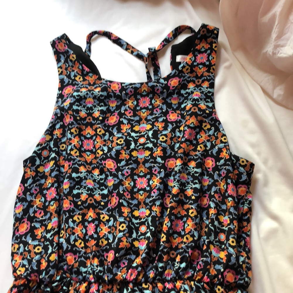 Knee-length floral dress with cinched waistline